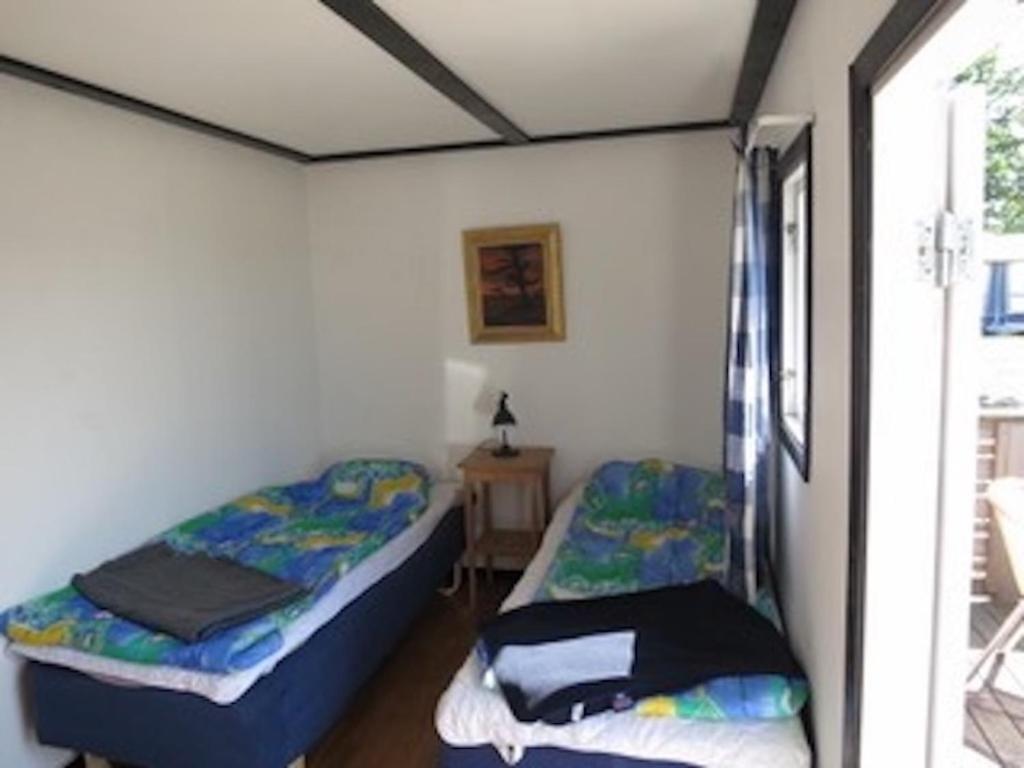 Strandbaden Koepingsvik Bilik gambar